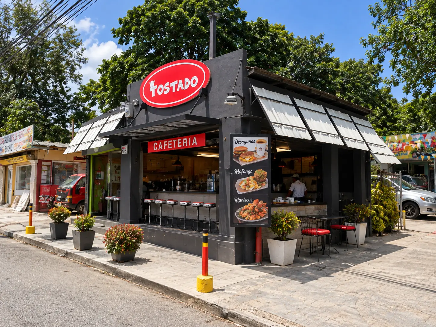 Tostado Santo Domingo Oeste counter with stools and menu boards for desayunos, mofongo and mariscos