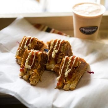 Tostado toasted sandwich quarters with a batida