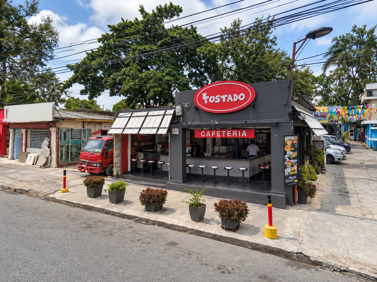 Tostado cafeteria in Santo Domingo Oeste with its red oval sign and street-side counter